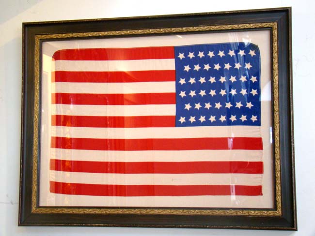 A beautiful silk 46 star flag in the "dancing star pattern" circa 1908